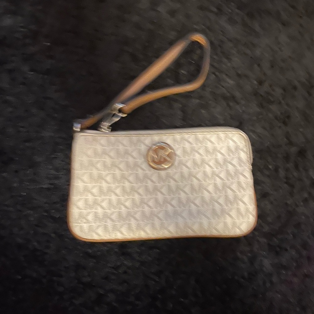 MK wristlet in white and cream